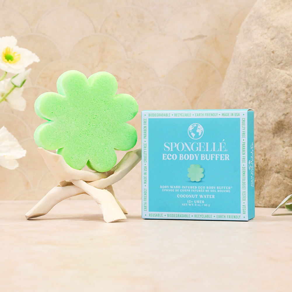 Green eco body buffer and packaging on a neutral background